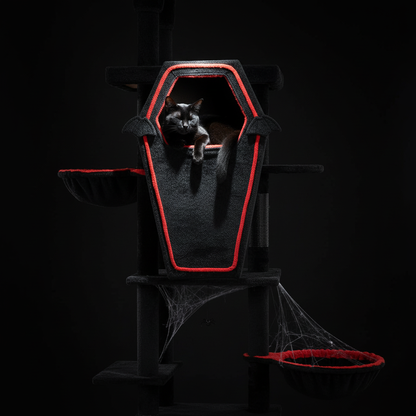 Bombay cat lounging in gothic coffin bed on tall cat tower